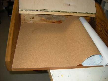 I lined the floor of the top with self-adhesive cork.